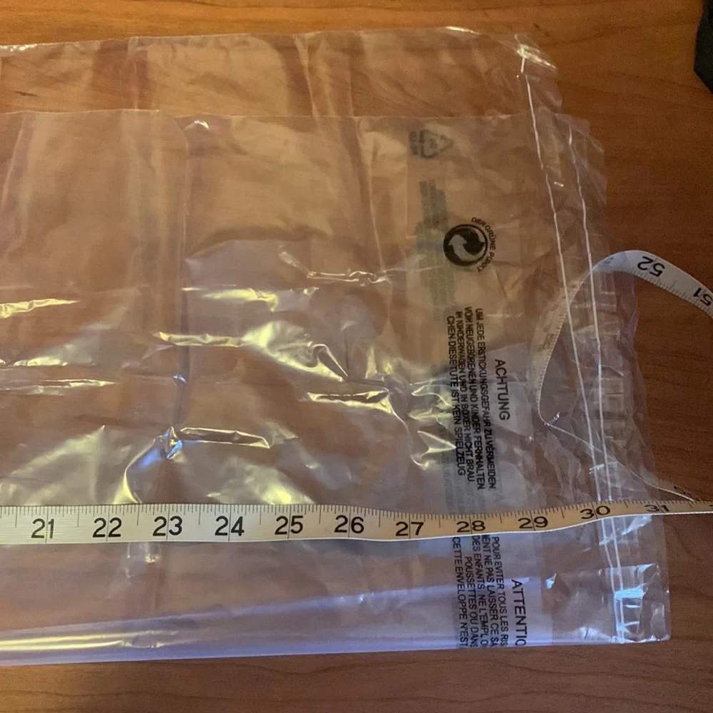 GUESS plastic garment cover
